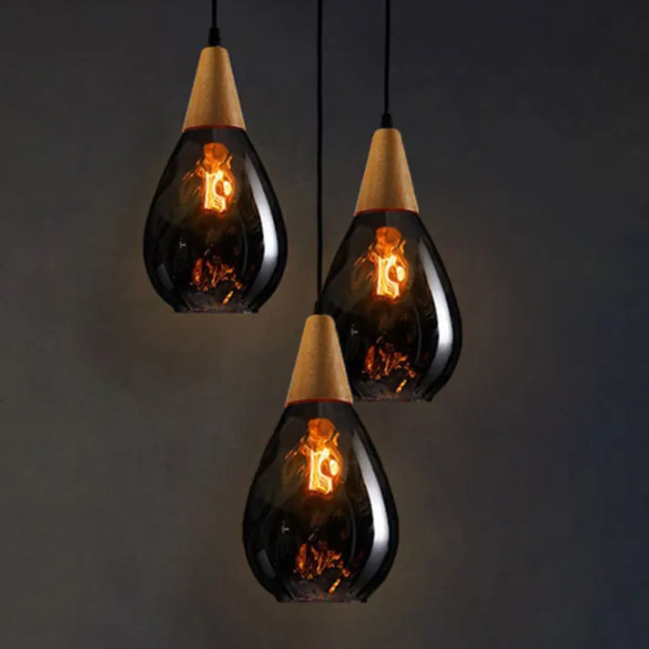 Elegant glass teardrop pendant for a sophisticated modern interior.