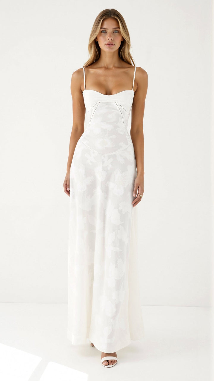 Women's formal bustier maxi dress in a soft hue, suitable for an elegant party or event.