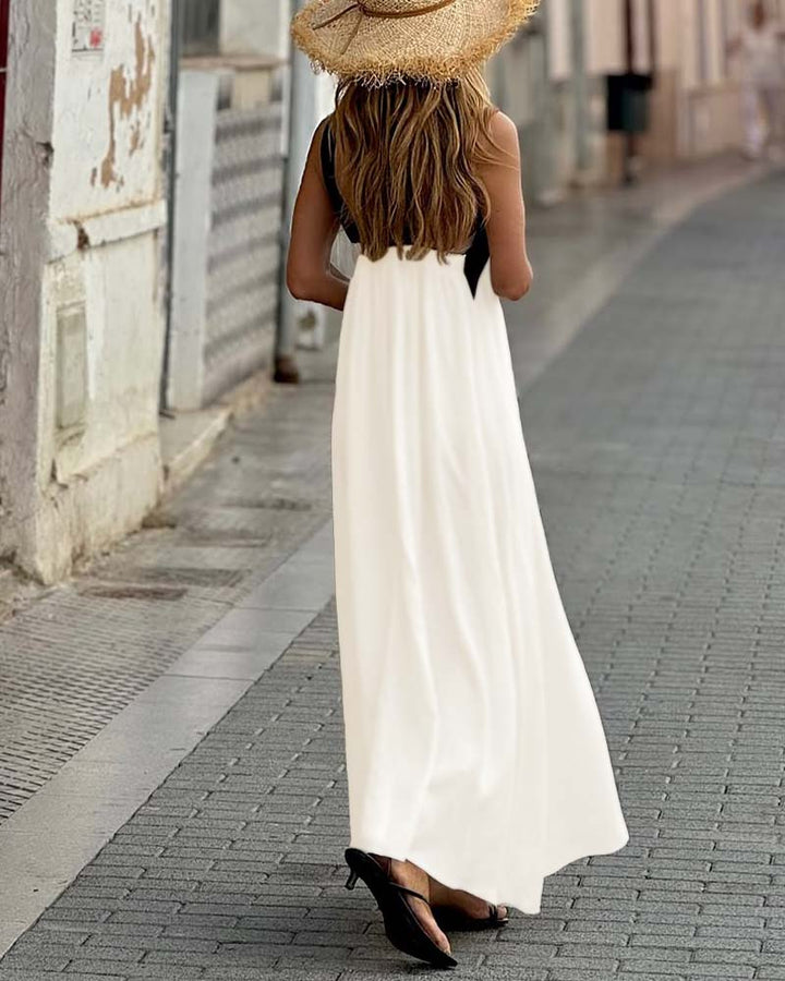 Close up of cross neck detail on elegant white A-line women's midi summer dress