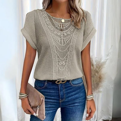 Stylish women's summer lace top with long sleeves, offering an elegant vintage look