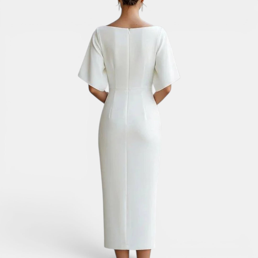 Beautiful white summer midi dress for women, offering an elegant & versatile sophisticated style.