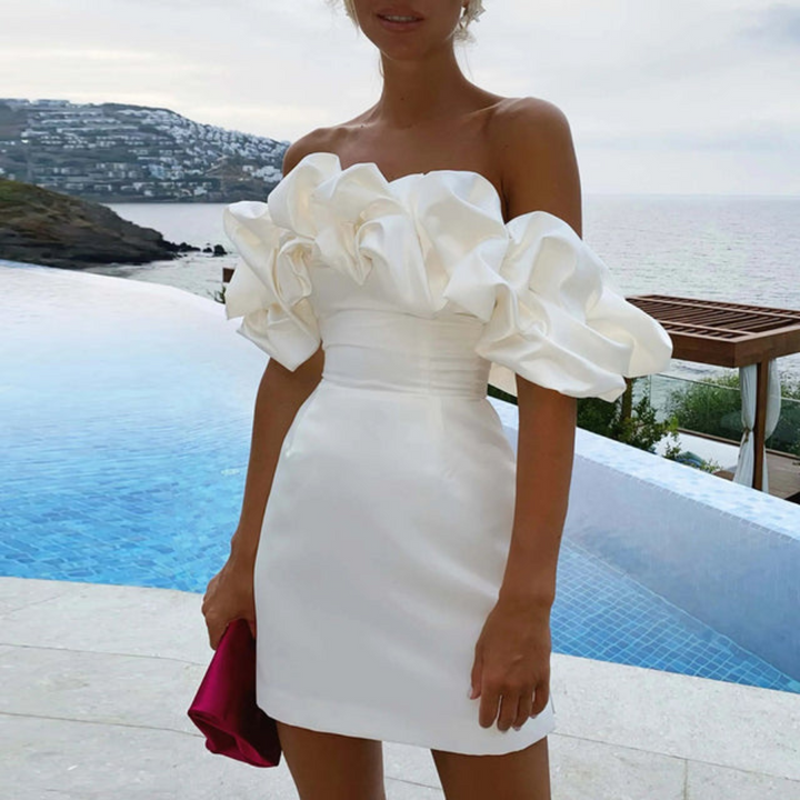 Elegant white ruffle mini dress perfect for summer wedding guests or casual parties
