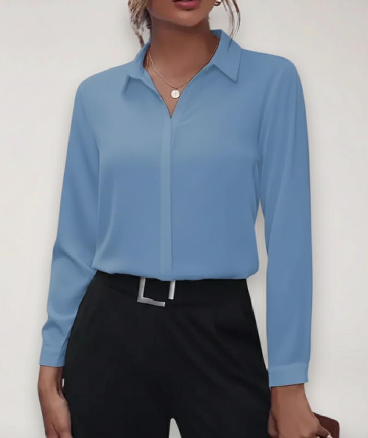 Women's elegant tailored button-up top, a chic and professional summer fashion choice