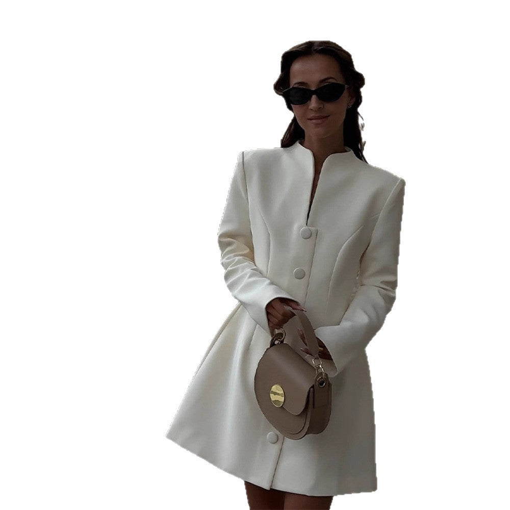 Women's elegant white blazer dress, featuring a tailored silhouette for a sophisticated and modern look.