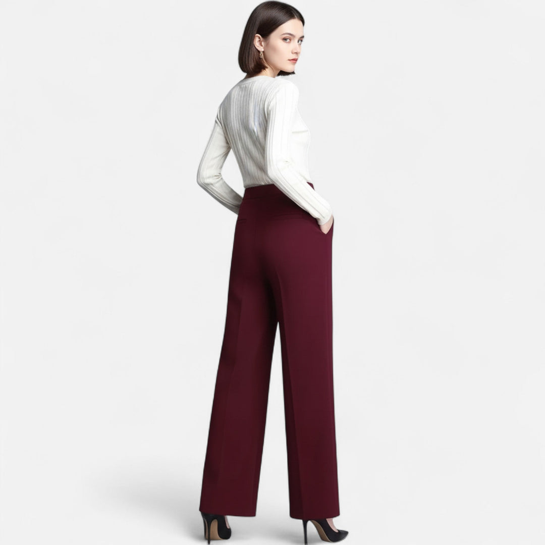 Stylish navy women's wide-leg high-waist trousers, ideal for an elegant office look or comfortable casual day.