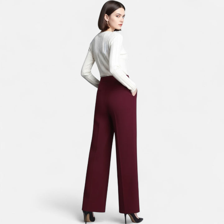 Stylish navy women's wide-leg high-waist trousers, ideal for an elegant office look or comfortable casual day.