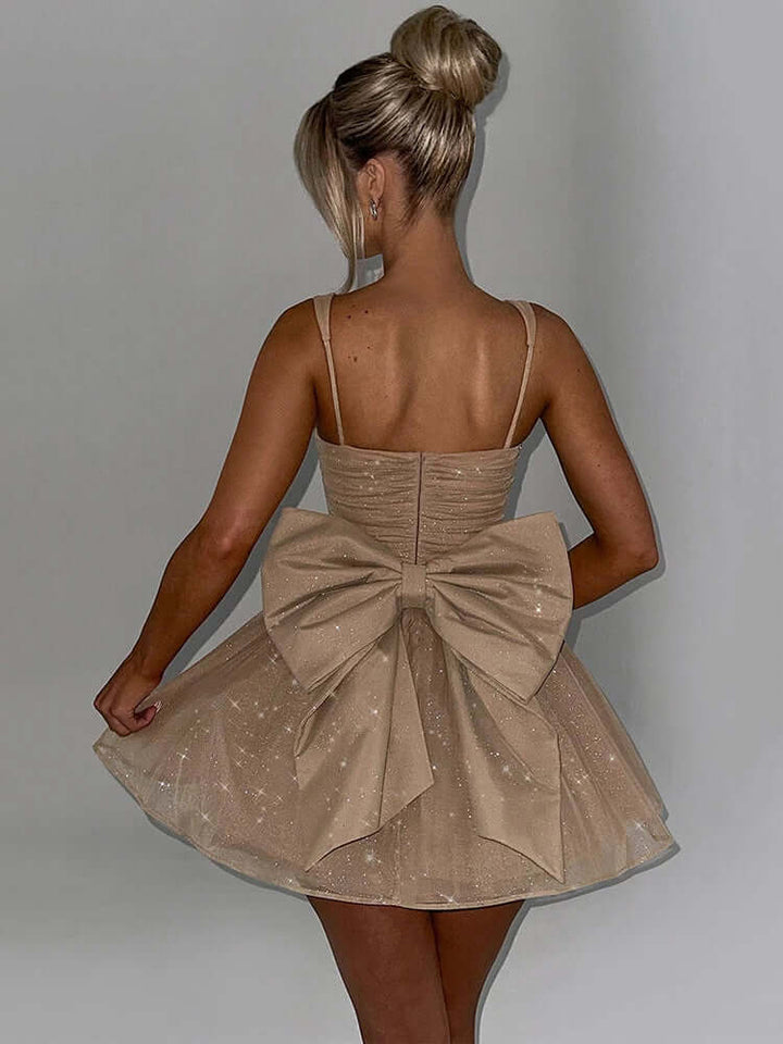 Stylish women's A-line party dress, sleeveless, with a sophisticated bow detail. Great for special events.