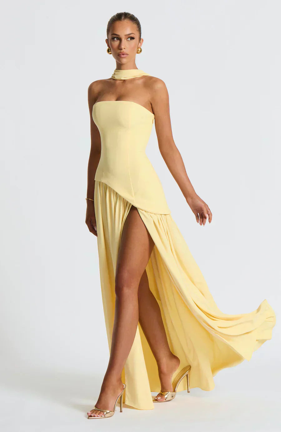 Elegant women's asymmetric maxi dress in a flowing silhouette, perfect for wedding guests and formal evenings.