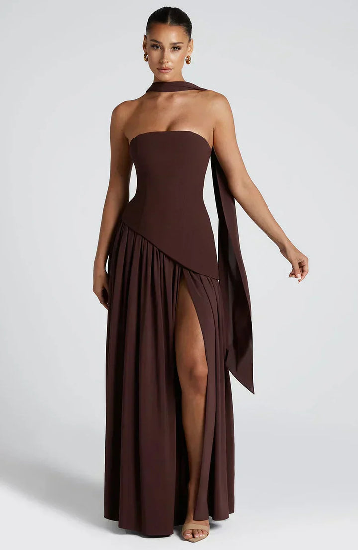 Contemporary women's evening gown: an asymmetric maxi dress that combines elegance and modern fashion sensibilities.