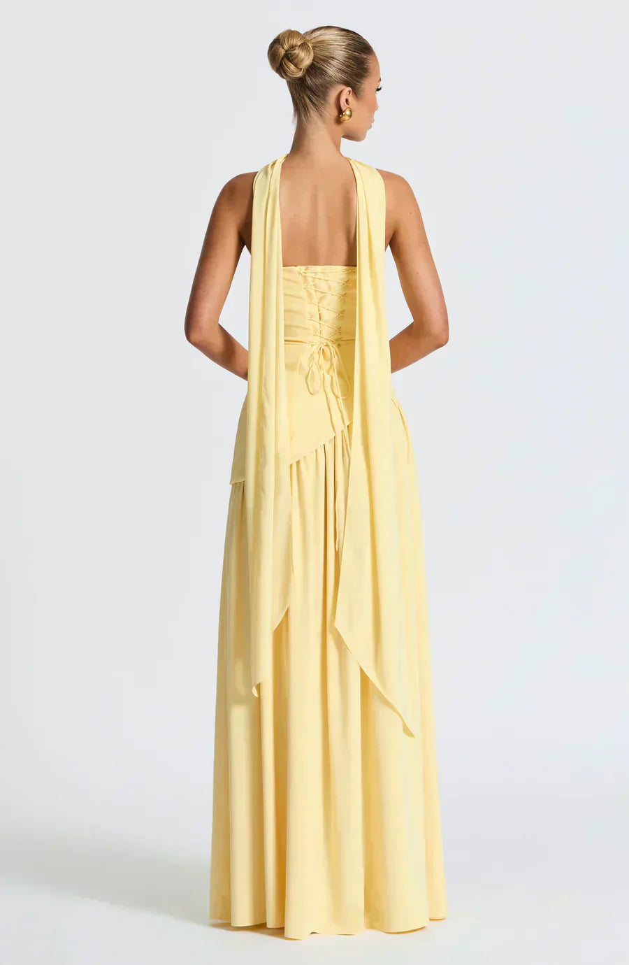 Wedding guest elegant asymmetric maxi dress for women, featuring a sophisticated high-low hemline and flattering drape.