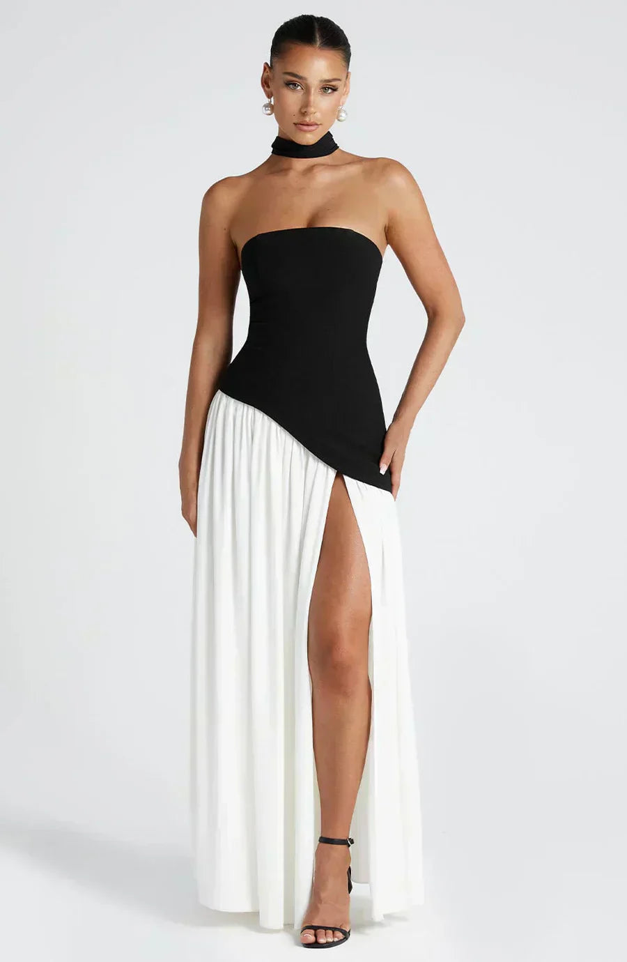 Beautiful asymmetric maxi dress for women, designed for wedding guests, showcasing elegant lines and a modern cut.
