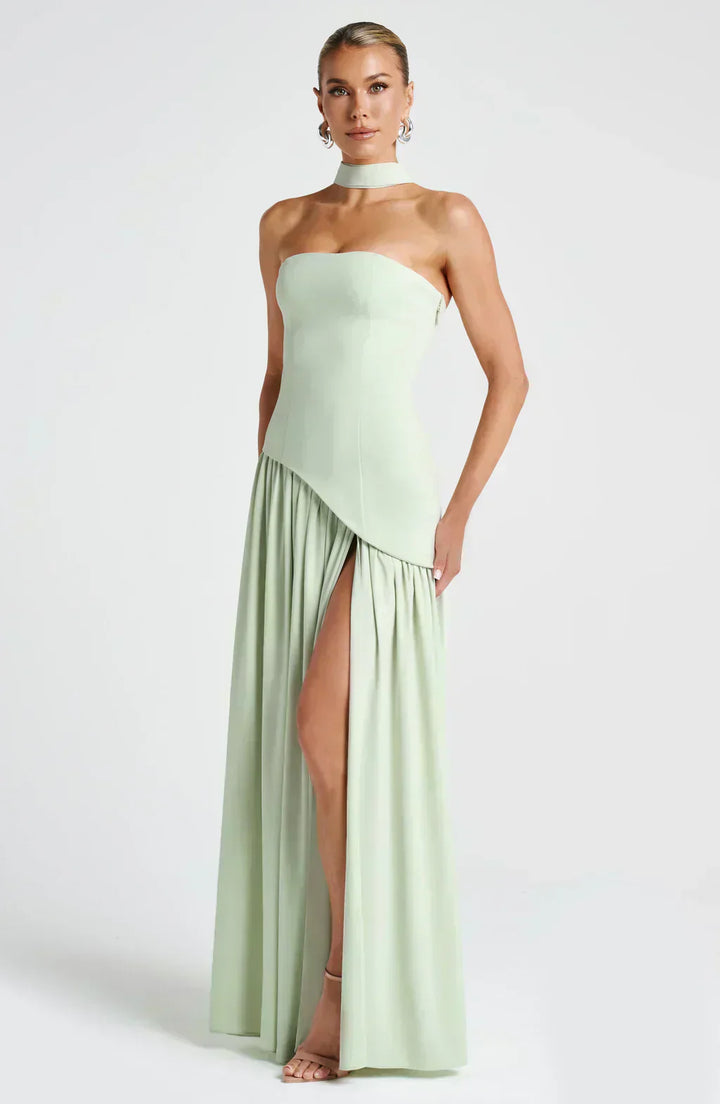 Flattering asymmetric maxi dress for women, a top choice for wedding guests seeking an elegant and contemporary look.