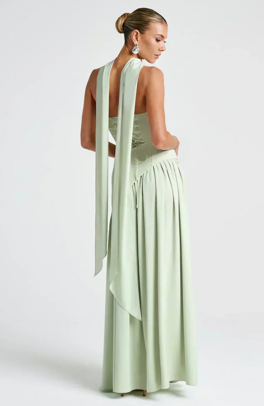 High-quality women's formal dress: an asymmetric maxi design, showcasing exquisite tailoring and refined style.
