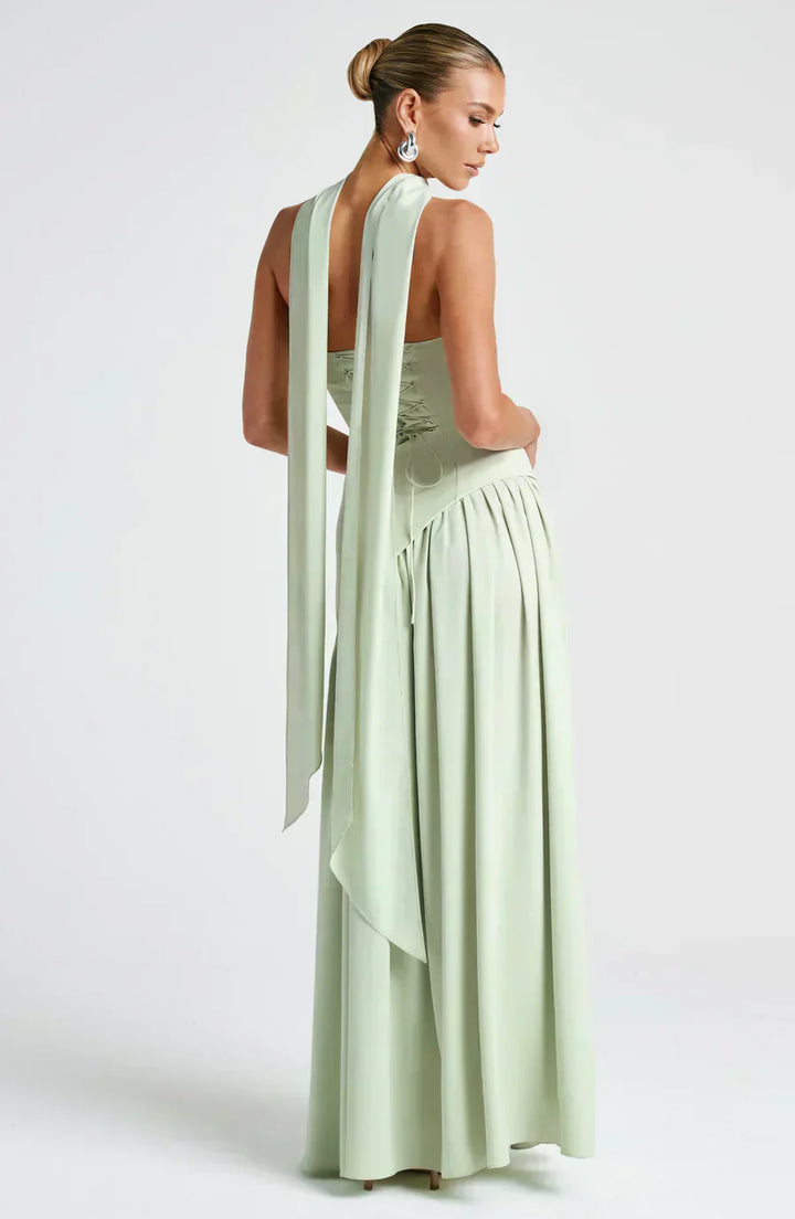 High-quality women's formal dress: an asymmetric maxi design, showcasing exquisite tailoring and refined style.
