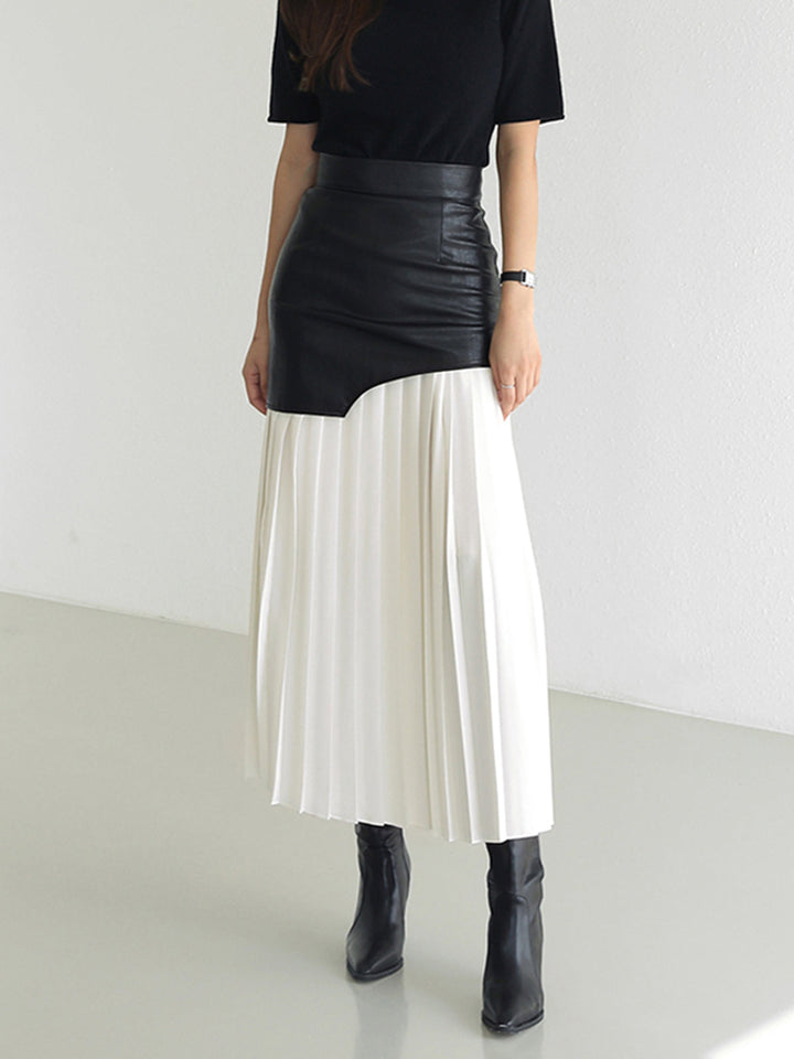 Elegant women's asymmetrical pleated midi skirt in a flowing fabric, perfect for summer fashion.