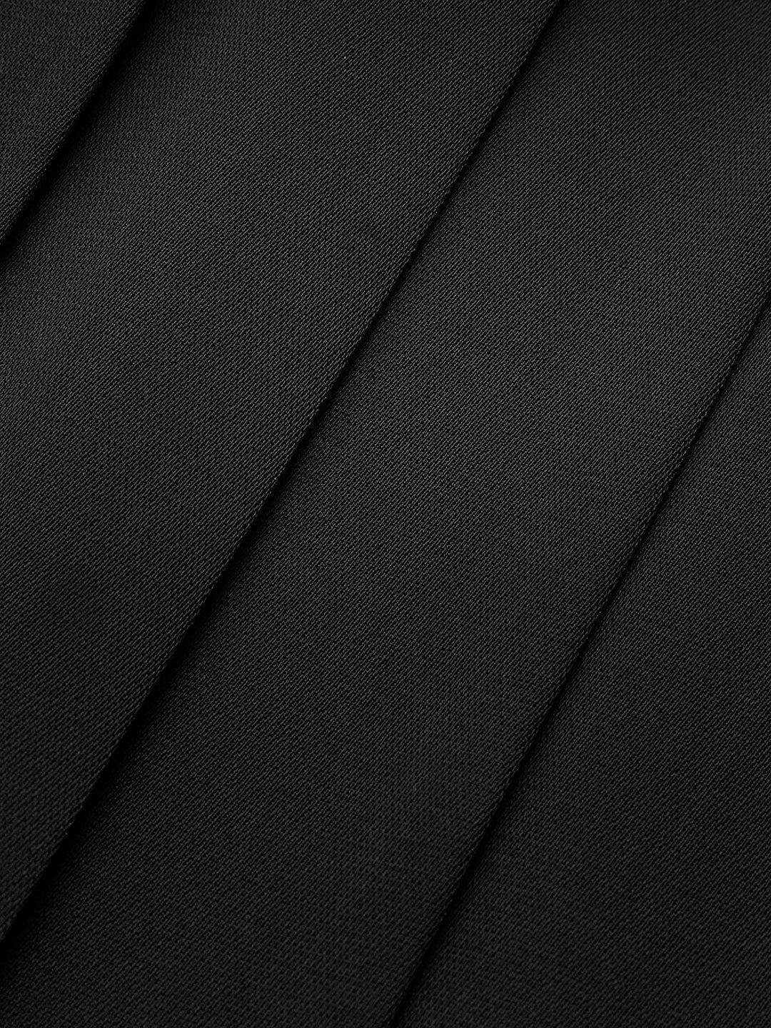 Versatile women's midi skirt with asymmetrical design and classic pleats, great for office or leisure.
