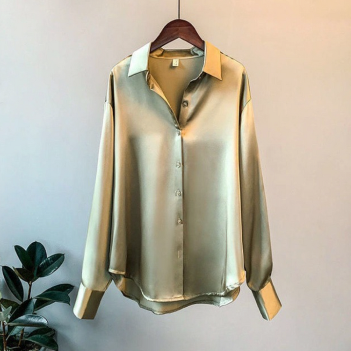 Elegant women's beige button-down office blouse, professional classic workwear top.