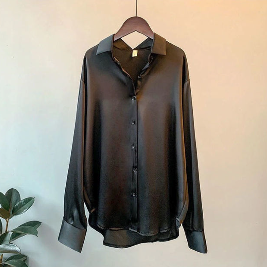 Classic black button-down blouse for women, ideal professional office attire.