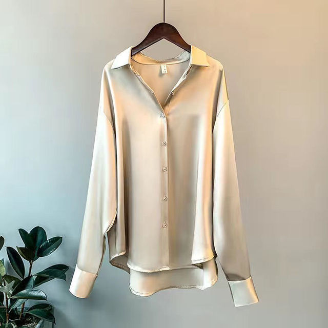 Professional olive button-down blouse, a chic and smart option for women's office wear.