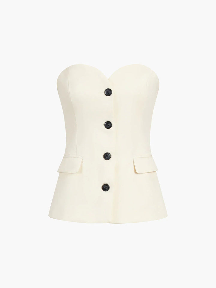 Women's matching beige set featuring a corset style top and comfortable high-waist wide-leg pants. Stylish outfit.