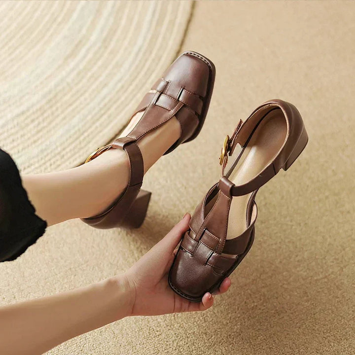 Stylish women's brown square toe sandals featuring a supportive block heel and chic T-strap design for comfort.