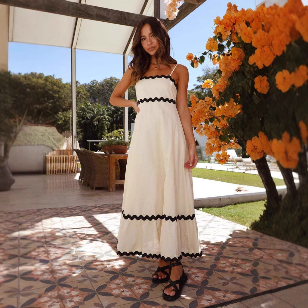 Stylish sleeveless A-line maxi dress for women, with thin spaghetti straps, ideal for warm weather.