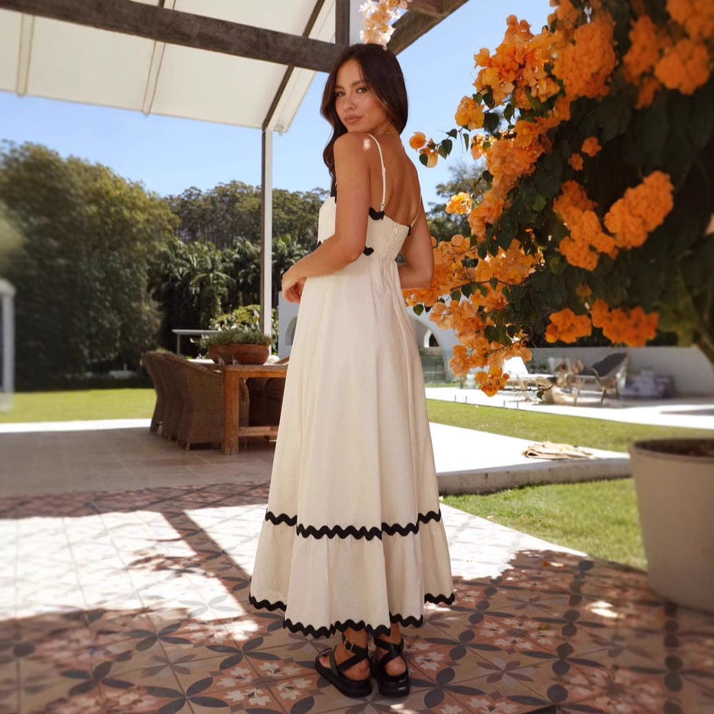 Women's summer A-line maxi dress with spaghetti straps and a flattering, elegant silhouette.