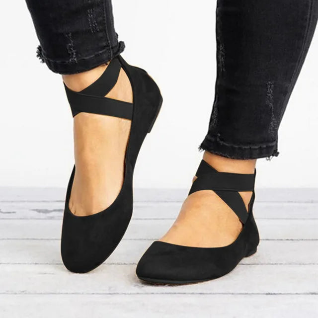 Comfortable women's spring flats, featuring stylish cross-straps and a versatile design.