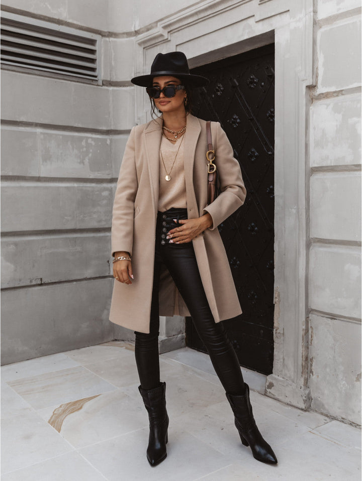 Elegant women's black button-front formal coat, perfect for business wear and winter fashion.