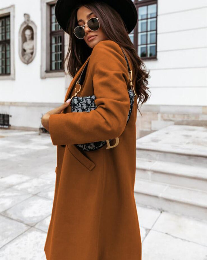 Luxurious women's formal coat, button-front design, offering warmth and style in colder seasons.