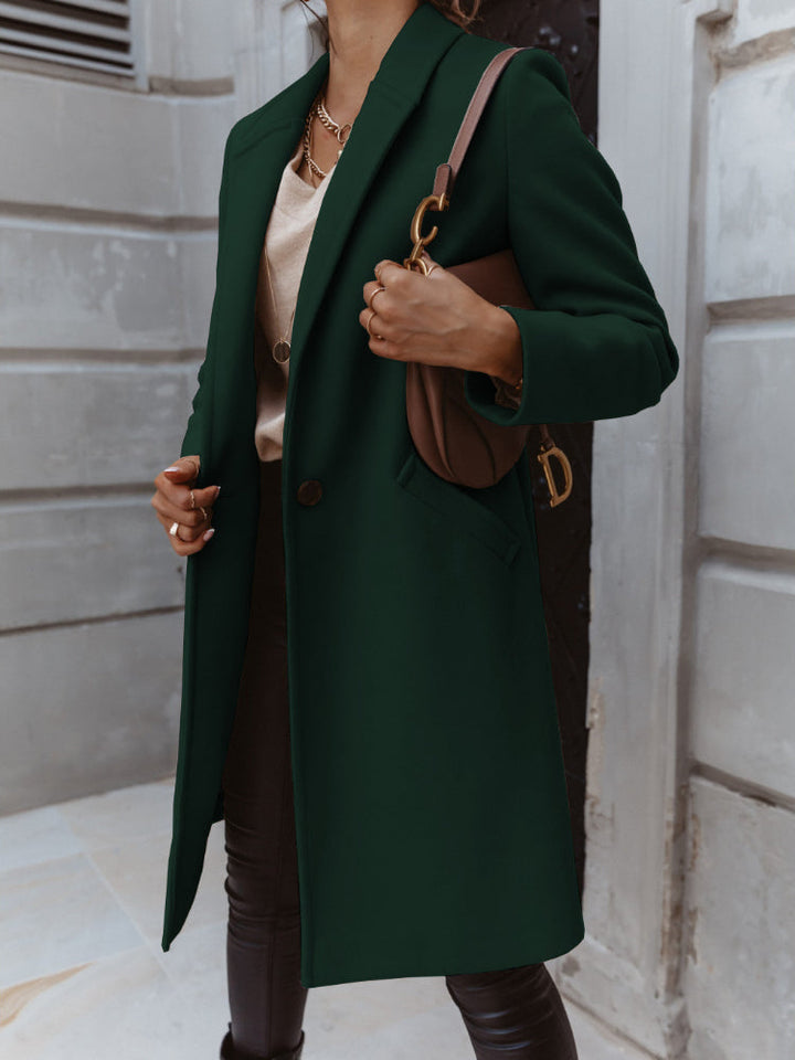 Professional women's formal coat with a button-front closure, versatile for any elegant ensemble.