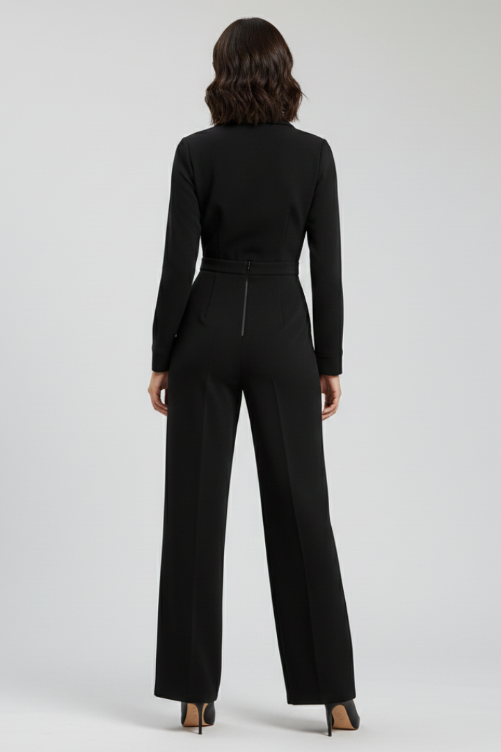 Close-up of the collar detail on a women's collared wide-leg tailored jumpsuit, premium fabric.