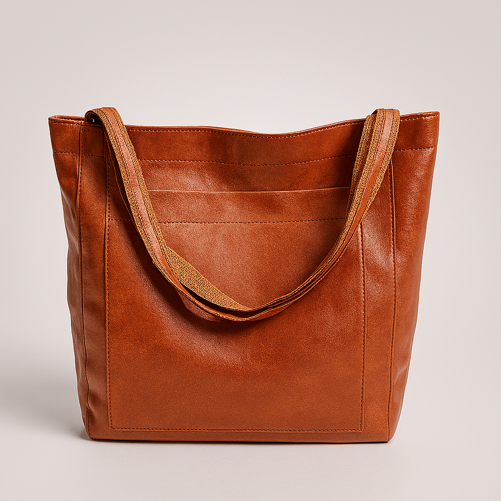 Elegant women's black faux leather shoulder bag with gold-tone hardware, perfect for daily use or work.