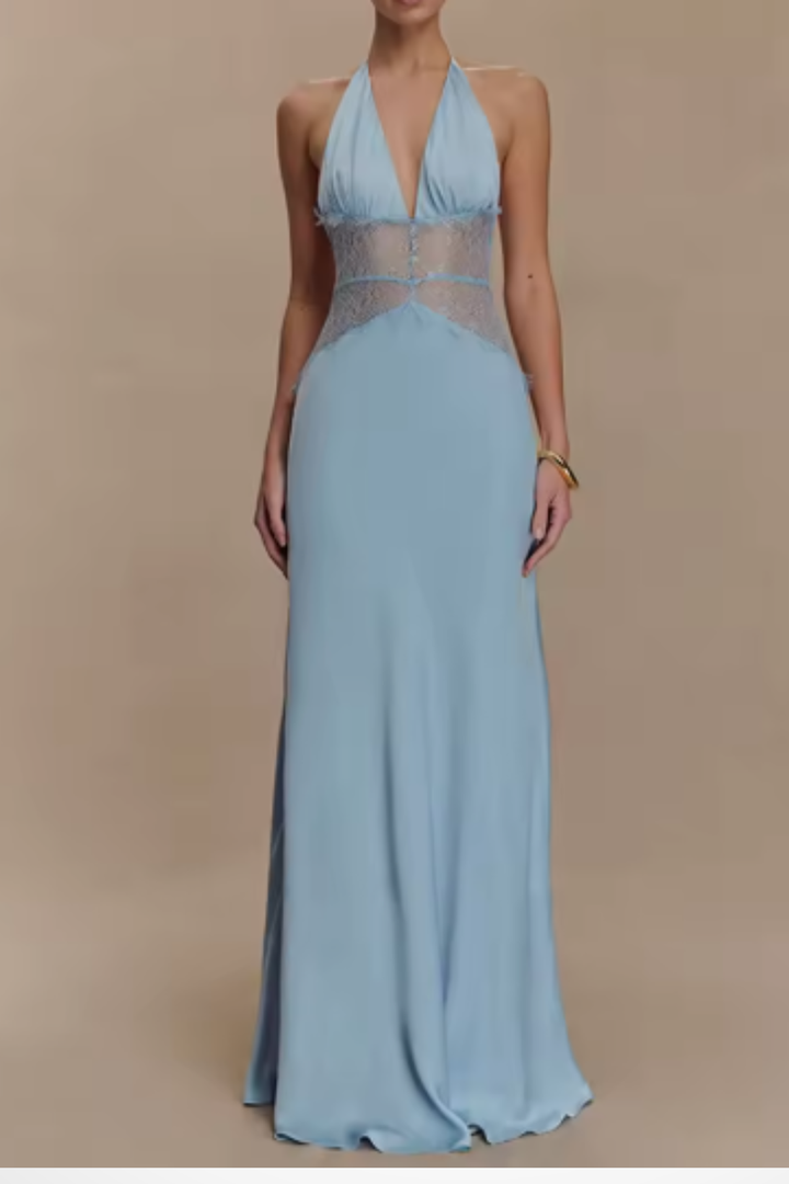 Women's white halter neck backless evening gown, a chic choice for formal events and celebrations.