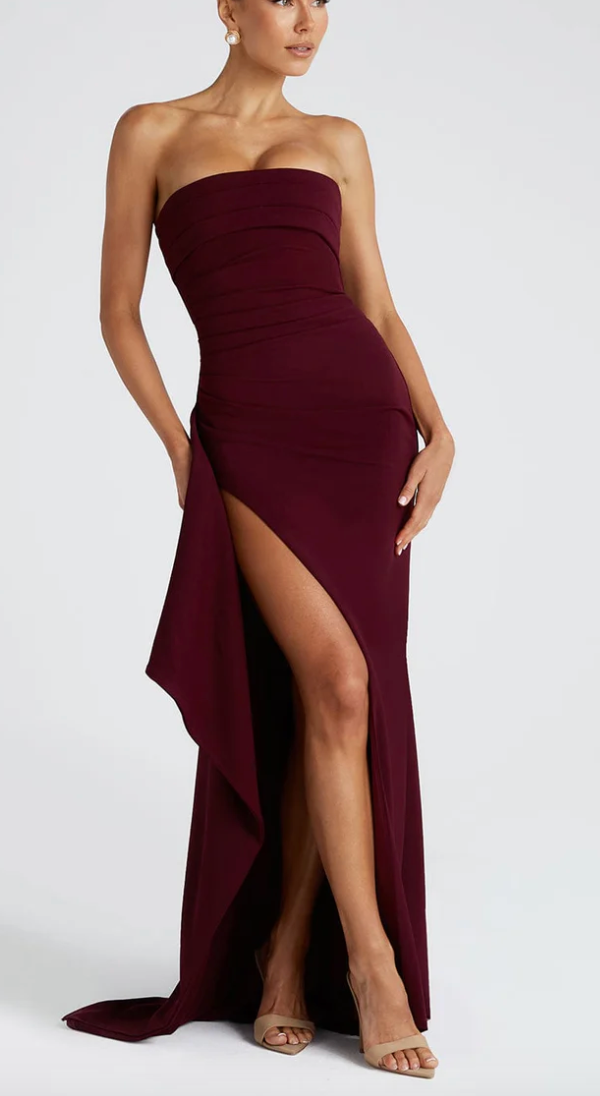 Timeless black strapless maxi dress with a dramatic high slit, an elegant occasion dress.