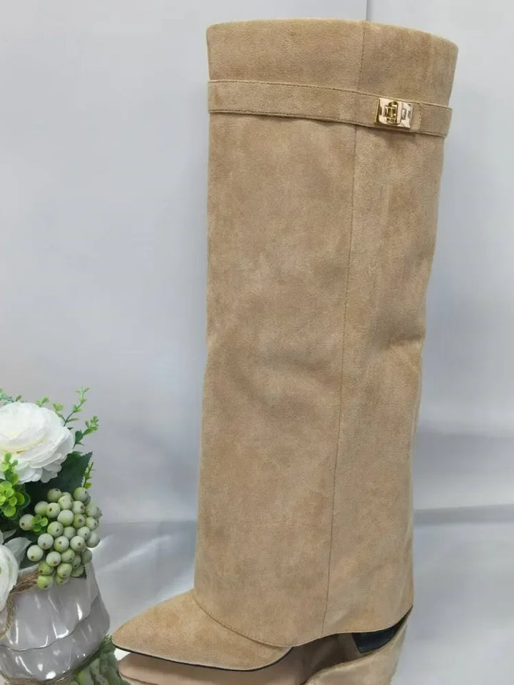 Elegant women's black leather thigh-high boots with side buckle accent, perfect for fall fashion.