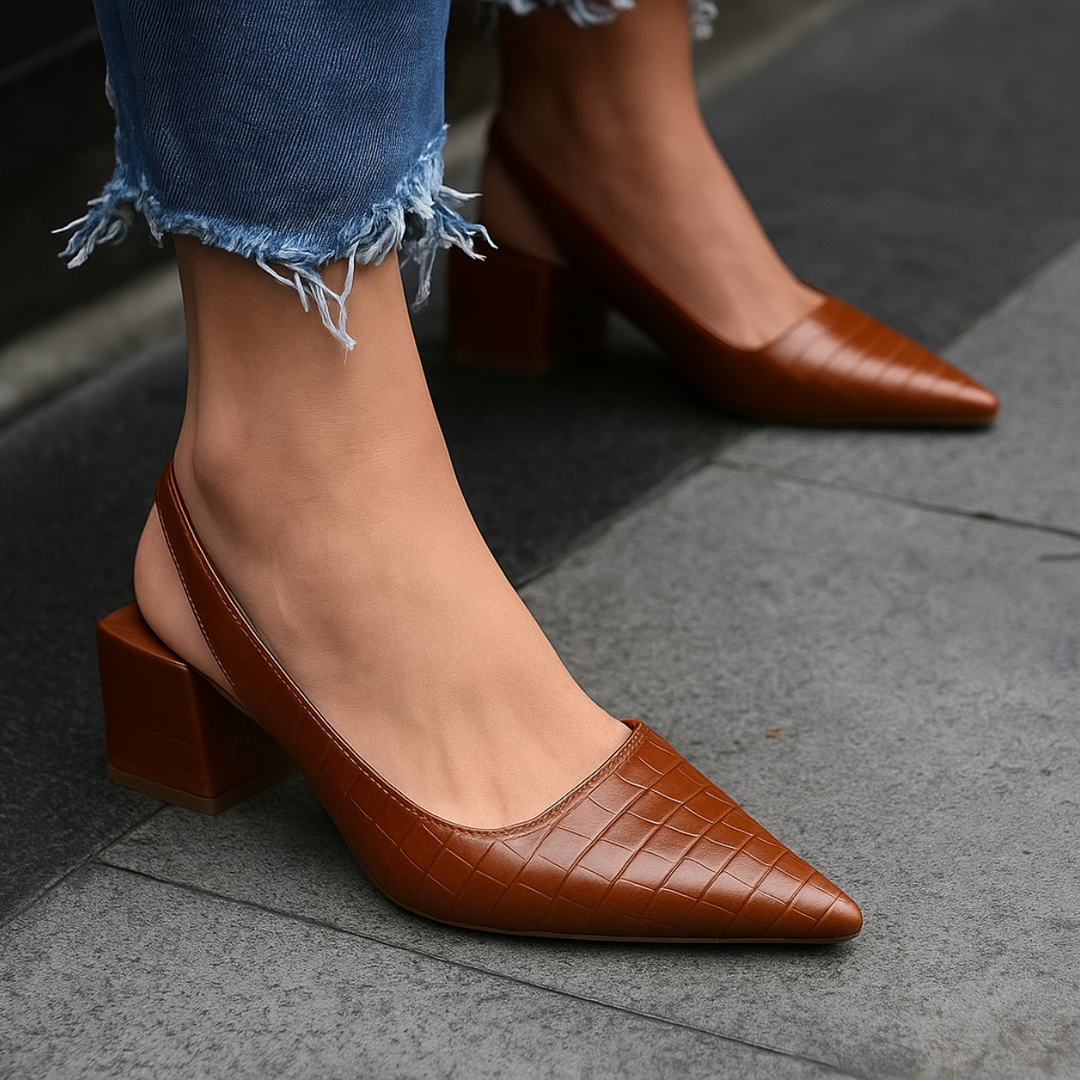 Comfortable women's pointed toe block heel pumps in a neutral color, ideal for elegant casual or formal outfits.