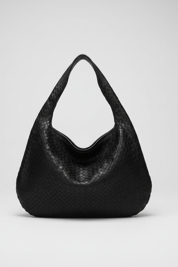 Elegant women's black rounded single strap shoulder bag, perfect for everyday or summer outings.