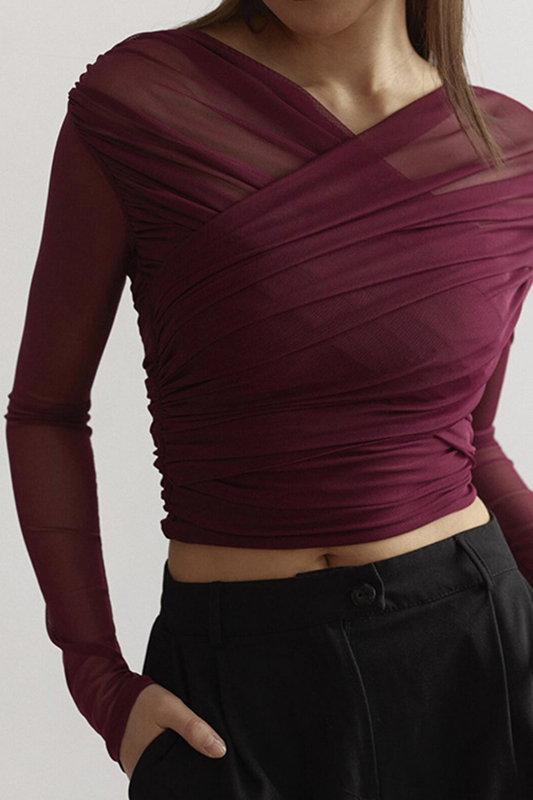 Elegant women's black ruched mesh long sleeve top, perfect for summer fashion and versatile styling.