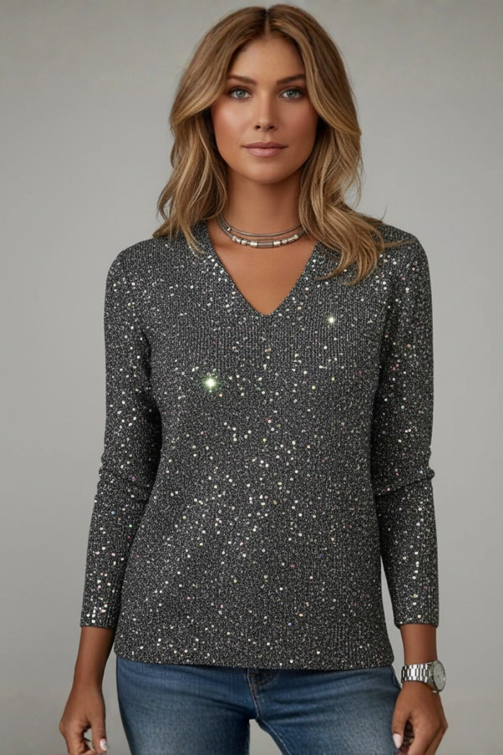 Fashionable women's sequin long sleeve V-neck sweater in a comfortable knit, perfect for elegant winter parties