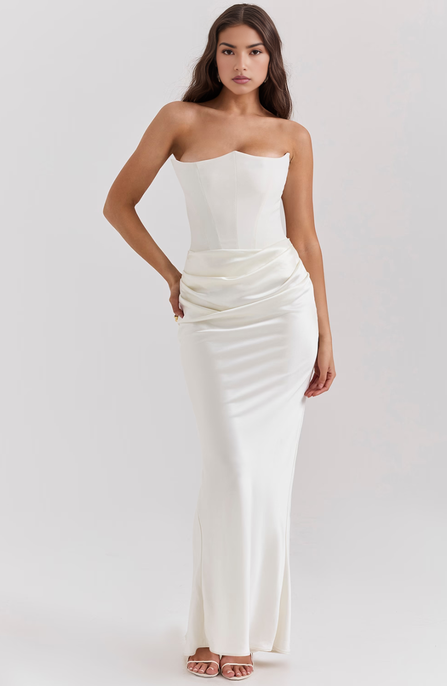 Model wearing a red strapless corset bodycon maxi dress, showcasing women's party dress style.