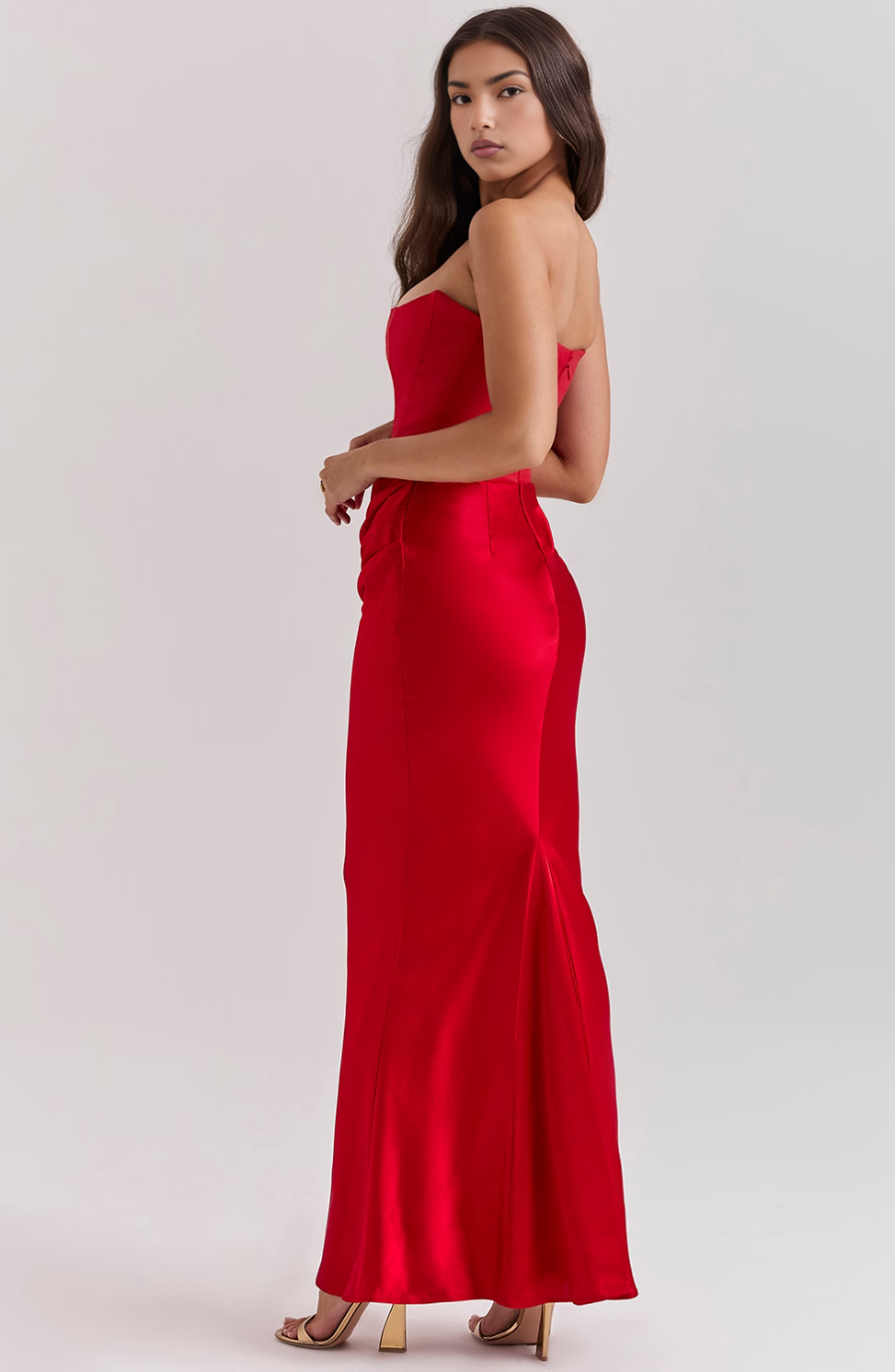 Chic white strapless bodycon maxi dress with corset, essential women's formal evening wear.