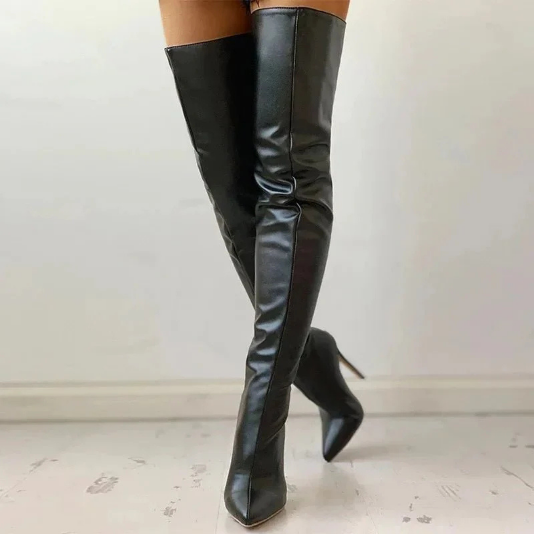 Fashionable red thigh-high boots for women, featuring a chic pointed toe, high heel, and easy zipper closure.