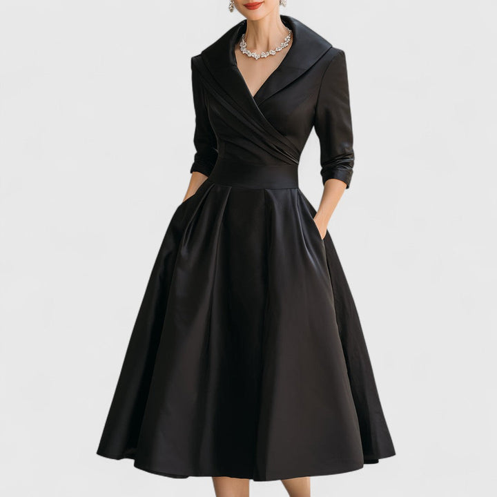 Elegant women's black V-neck midi dress with 3/4 sleeves and a flared skirt, perfect for formal occasions.