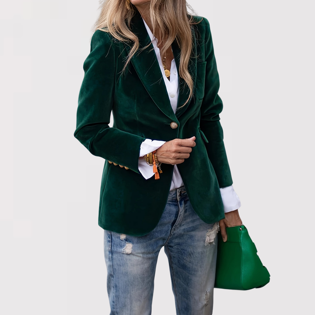 Elegant women's black velvet blazer jacket for formal evening wear, front view.