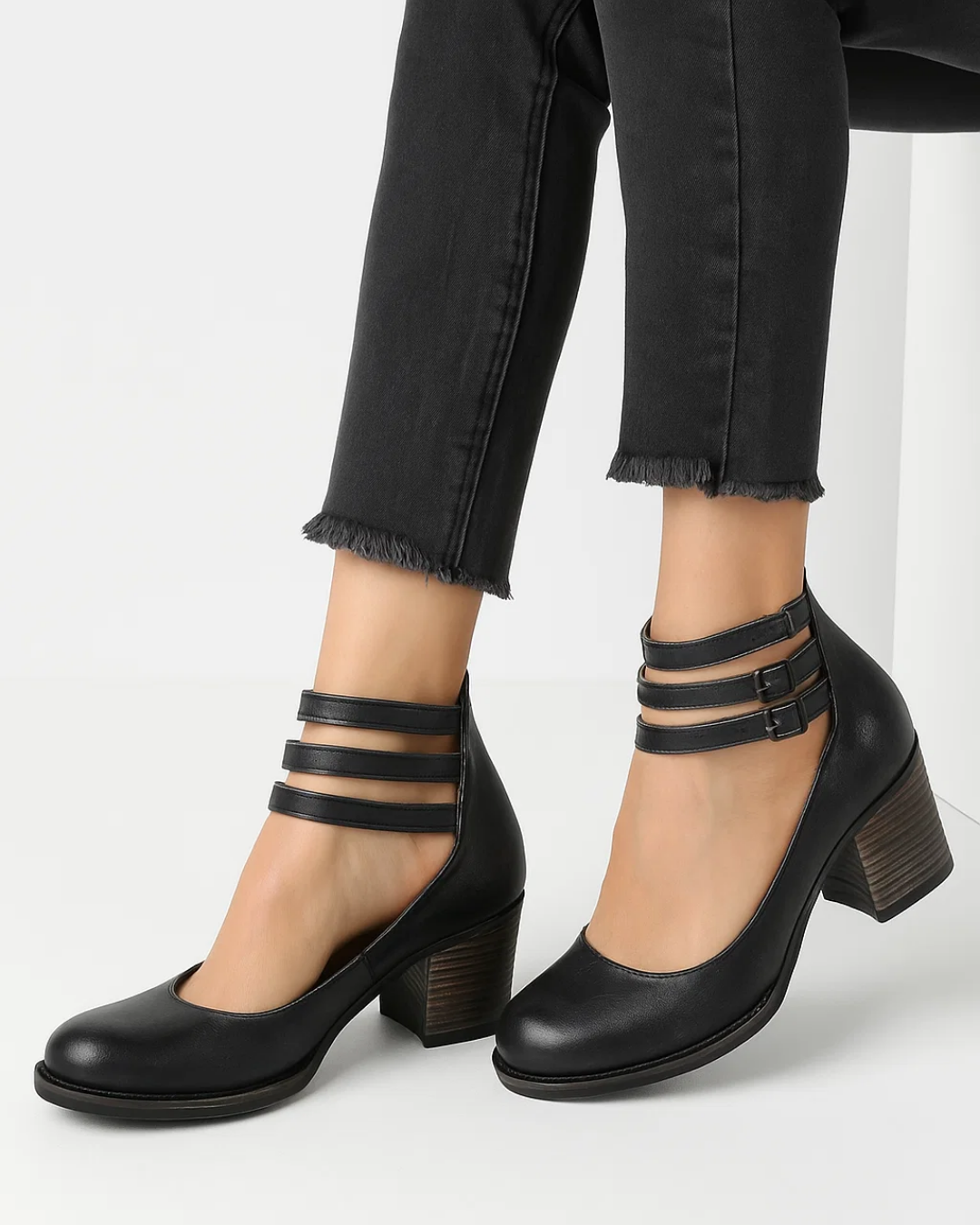 Versatile women's block heel pumps featuring comfortable block heels and chic ankle straps for dressy occasions.