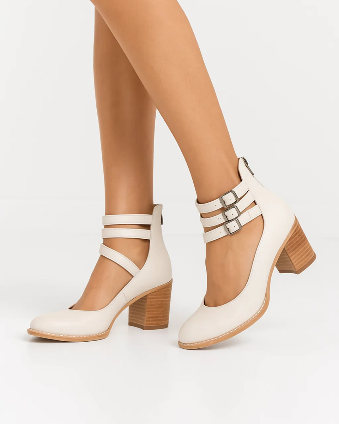 Classic women's block heel pumps, designed with a secure ankle strap. Elegant footwear for formal, office, and evening.