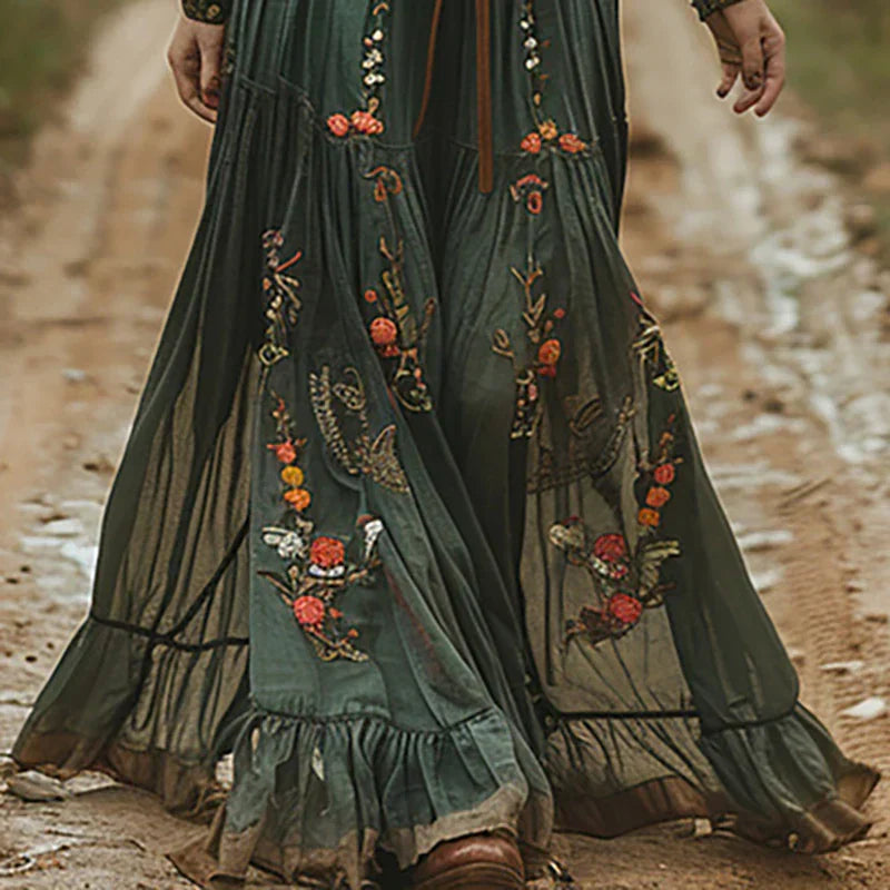 Women's long sleeve boho maxi dress with a V-neck, floral embroidery, and a flattering belted waist