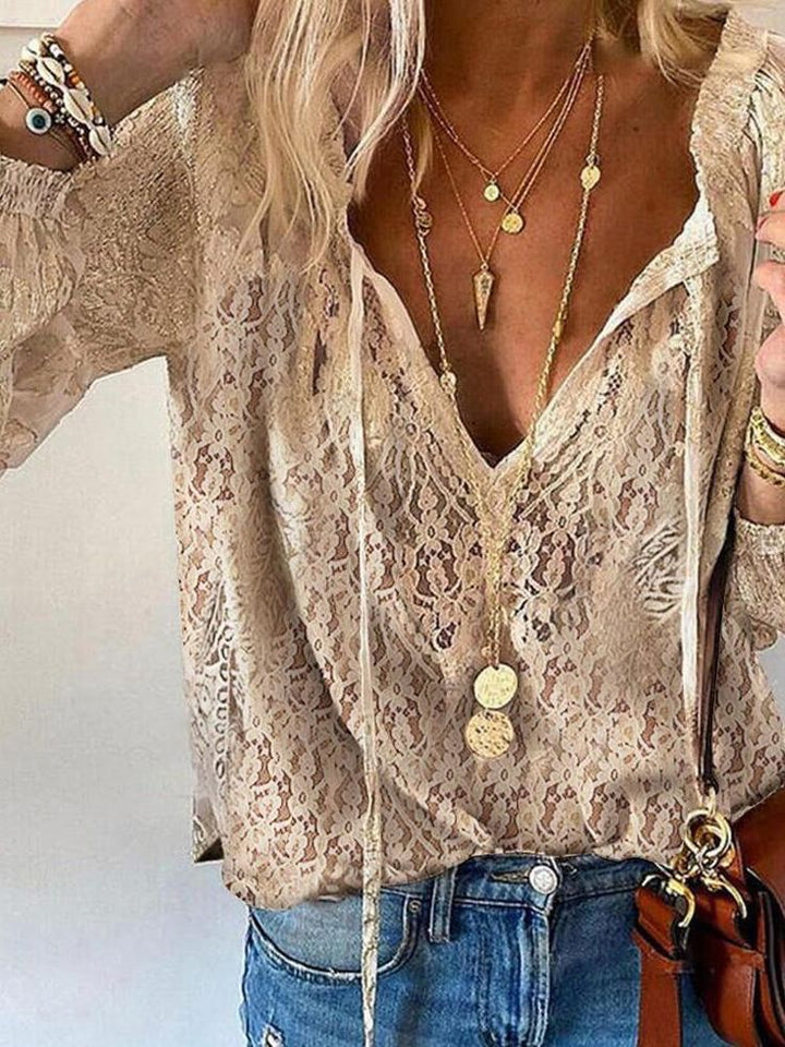 Elegant women's boho V-neck blouse, perfect for summer casual wear and beach style.