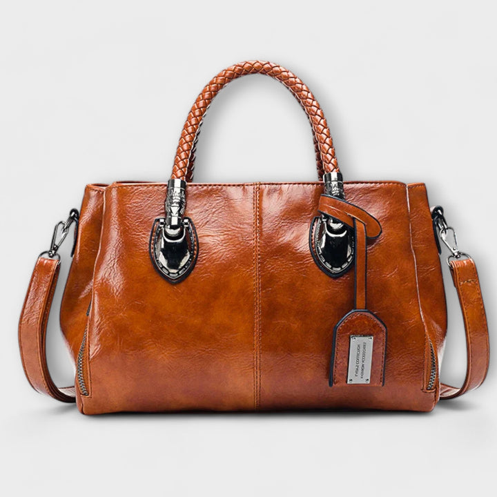 Elegant women's braided handle handbag in black, perfect summer fashion accessory